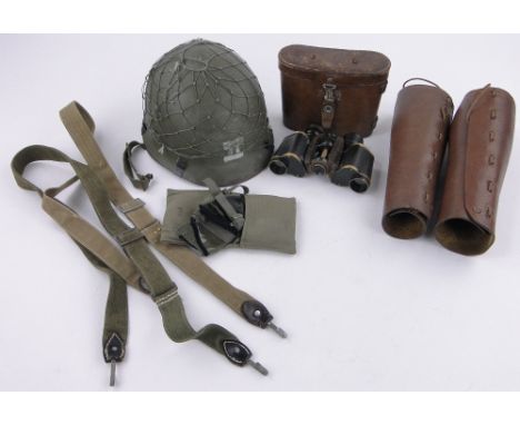 Group of Second World War German Military items,including Afrika Korps goggles, helmet, Puttees, etc.