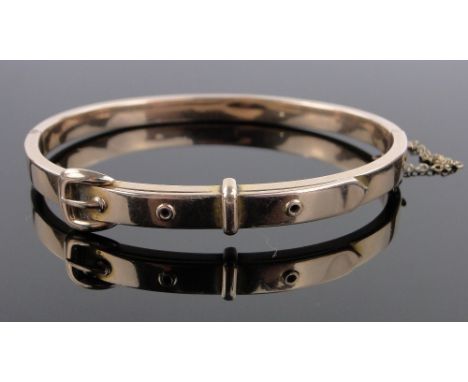A Victorian unmarked gold buckle design hinged bangle,9.6g.