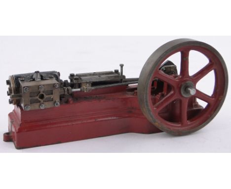 A Stuart stationary engine,length 20cm.