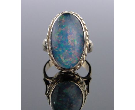 A 9ct gold opal doublet set ring,setting height 22mm, size N.