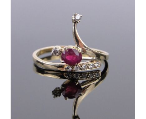 A 14ct gold ruby and diamond set ring,size M.