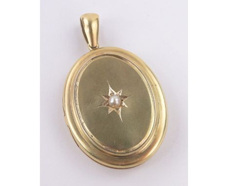 A Victorian unmarked gold oval locket,with pearl set lid, 13g, height excluding loop 38mm.