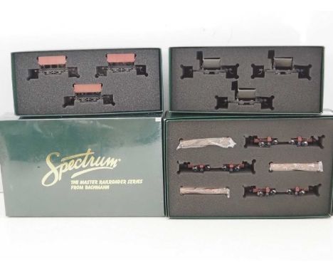 A group of SPECTRUM On30 scale logging and mining car multi-packs  - VG in G/VG boxes (one is still factory sealed) (12 wagon