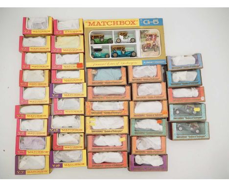 A tray of vintage MATCHBOX MODELS OF YESTERYEAR diecast cars - variants in pink and purple window boxes, multicolour boxes to