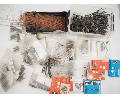 A large crate of HO gauge catenary and catenary accessories by SOMERFELDT, MARKLIN and others - G (mostly unboxed) (Q)
