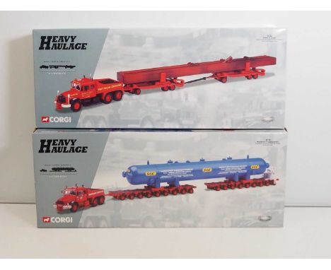 A pair of CORGI 1:50 scale 'Heavy Haulage' Series diecast lorries with large trailers and loads comprising 18004 and 18006 - 