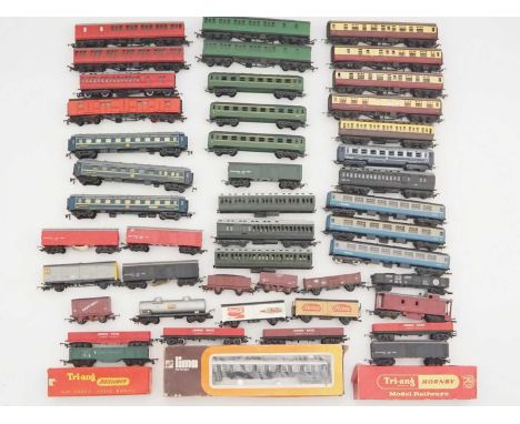 A large tray of mostly unboxed OO gauge passenger coaches by TRIANG, LIMA and others - F/G in F/G boxes (where boxed)(Q)