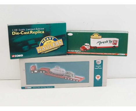 A group of CORGI 1:50 scale diecast American Outline articulated lorries from the 'Heavy Haulers' series - VG/E in VG boxes (