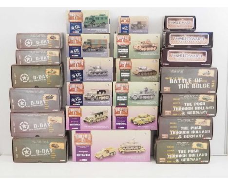 A group of CORGI 1:50 scale diecast tanks and military vehicles from the 'World War II' and 'D-Day 60th Anniversary' collecti
