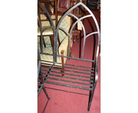 A Gothic style painted wrought iron arch backed three-seater garden bench, w.121.5cm