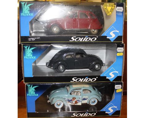 Three Solido Prestige 1/18 scale cars, to include Citroen 2CV VW and two VW Beetles