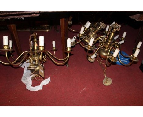 A set of four contemporary Dutch brass eight-light hanging electroliers, each having typical scroll branch arms, approx drop 