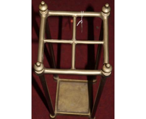 A late Victorian polished brass square four division stick stand, height 66.5cm