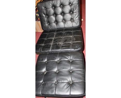 After Ludwig Mies van der Rohe - a Barcelona chair with footstool, the hollow chromed metal X-frame, with black leather butto