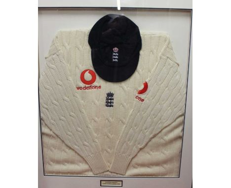 England Cricket interest - being framed jumper and cap attributed to Darren Gough in glazed case together with framed poster 