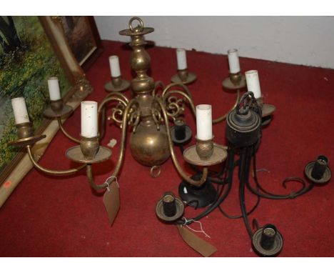 A Dutch style lacquered brass eight-light ceiling pendant; and one other metal example (2) 