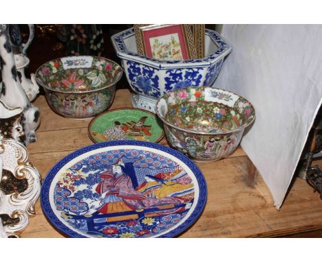 Oriental blue and white octagonal planter, pair of Cantonese style bowls, two plates and two Oriental pictures.