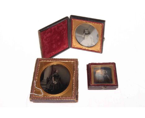 Four daguerreotype cased portrait photographs, one military.