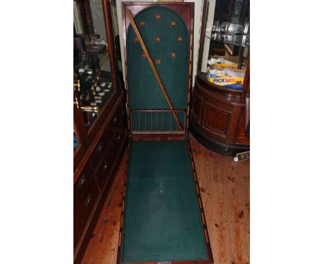 Vintage folding bar billiards table and accessories.