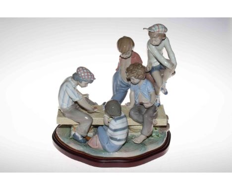 Nao Boys Playing Cards, sculptured by José Puche in 1992, 34cm high, 32cm across, factory mark scratched.