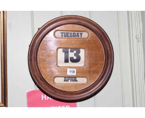 Vintage circular wall mounted perpetual calendar.