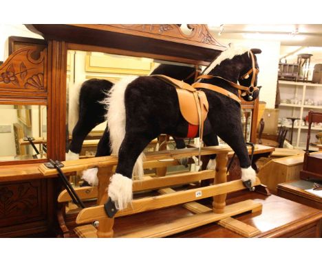 Rocking horse on pine safety stand, onyx standard lamp and shade and two military aircraft prints (4).
