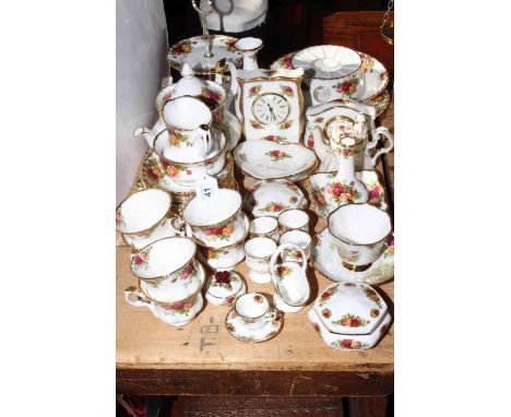 Collection of over forty pieces of Royal Albert Old Country Roses including twenty one piece tea service, cakestand, two cloc