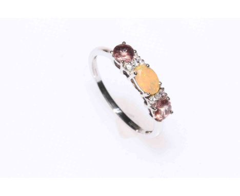 9k white gold colour change garnet and diamond ring, size N/O, and 9k white gold opal and colour change garnet ring, size S, 