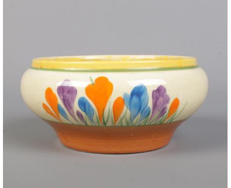 A Wilkinson Ltd. Clarice Cliff Bizzare low bowl in the crocus design. Height: 5.5cm. Diameter: 11.5cm.