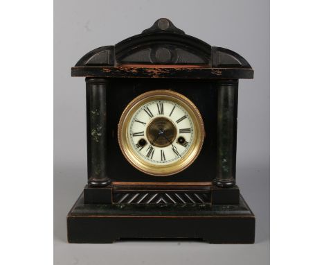 An ebonised wooden Hamburg American Clock Co. (HAC) mantle clock, No. 3056. The dial bearing Roman Numeral markers and centra