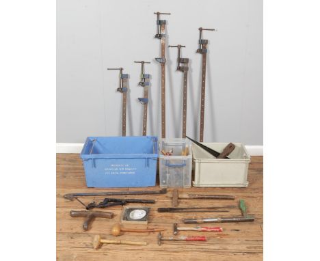 Three boxes containing a large collection of tools, to include forming stake, wooden mallets, hammers, bunsen burner gauzes e