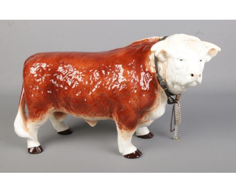 A large Melba Ware ceramic figure of a Herefordshire Bull. Approx. height 25cm.