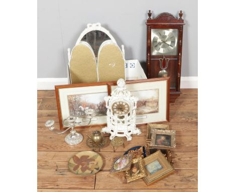 A box of mixed collectables including A selection of small frames, brass easels, brass piano candle sticks, ornate mantel clo