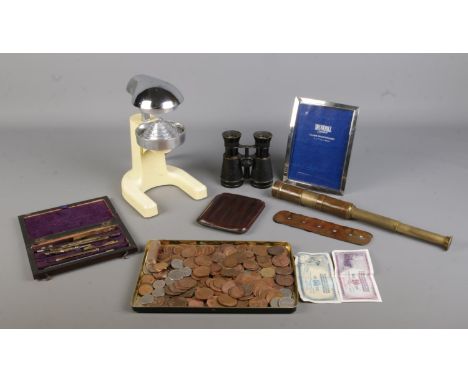 A quantity of collectables, to include three draw telescope, binoculars, vintage juicer, assorted coinage, photograph frame a