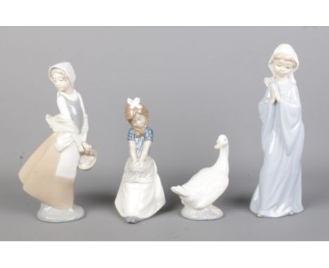 Four NAO by Lladro ceramic figures. Includes sitting girl, goose and girl with egg basket.