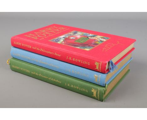 JK Rowling, three hard back Harry Potter deluxe edition books. Includes the Philosopher's Stone, the Chamber of Secrets First