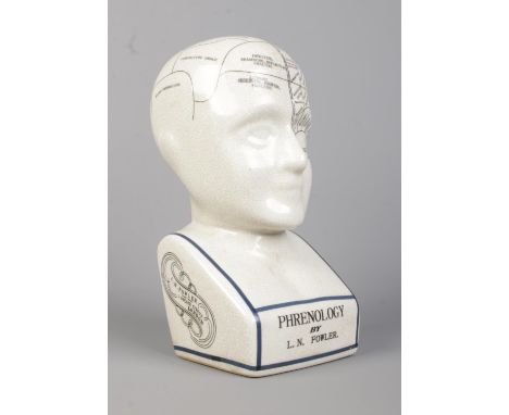 A L.N. Fowler ceramic phrenology head. Height: 29cm.