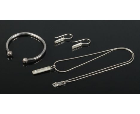A 925 silver jewellery suite and a silver bangle, all hallmarked, with a total weight of 18g.  The jewellery suite includes a
