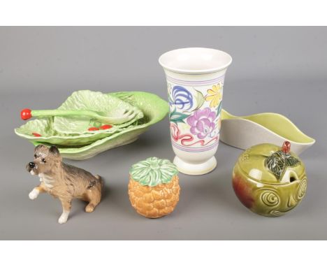 A collection of ceramics. Includes Poole, Royal Doulton dog, Carltonware, Sylvac apple sauce pot etc  Beswick leaf dish badly