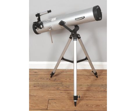 A Zennox telescope on tripod stand.