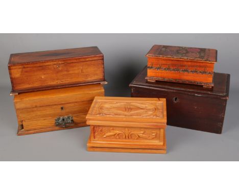 A collection of five vintage wooden boxes, including a canteen box with drawer, a carved jewellery box and a floral design tr