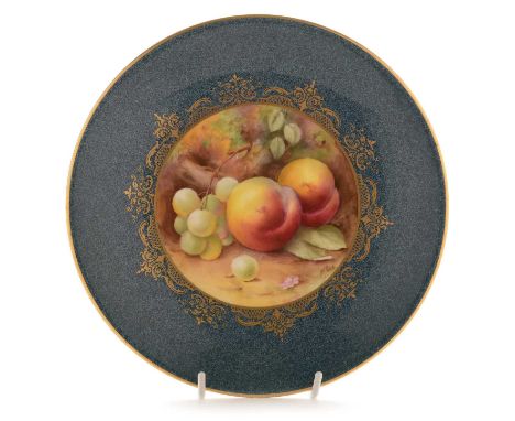 A Royal Worcester fruit painted dessert plate by Horace H Price, decorated with peaches and grapes, within a gilt border on a