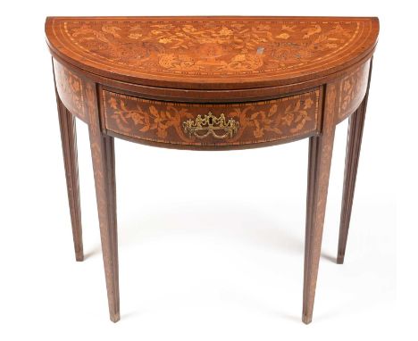 An early 19th Century Dutch marquetry demi lune card table, the hinged shaped top inlaid with central urn issuing flowers and