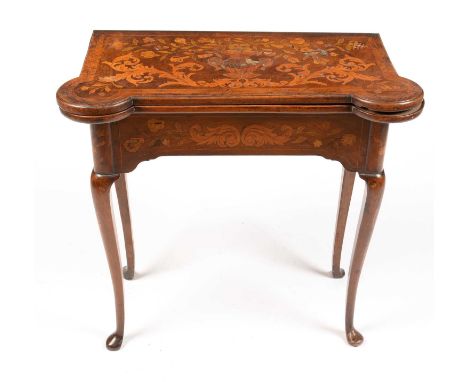 An 18th Century Dutch marquetry card table, the rectangular hinged top with lobed corners, inlaid with central urn issuing fo