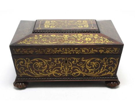 A Regency brass inlaid rosewood work box, of sarcophagus form, the lacquered brass inlay of floral scrolling decoration, flan