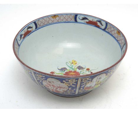 A rare Turner's Patent Ironstone type punch bowl, 1800-1805, decorated in the Chinese taste with alternating panels of figure