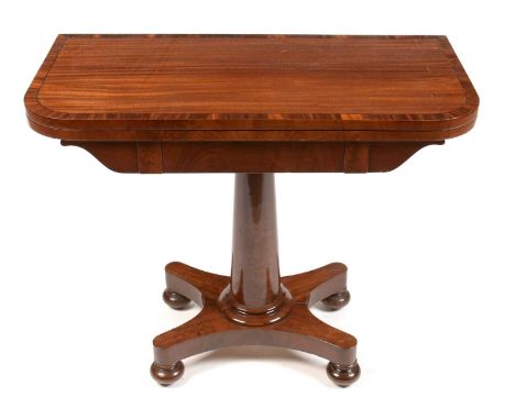 A Victorian mahogany and banded card table, the hinged swivel top opening to reveal a baize-lined playing surface, circular t