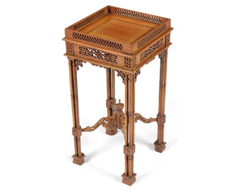 A 19th Century Chippendale Chinese style mahogany tea table, with all over pierced decoration, the raised gallery and square 