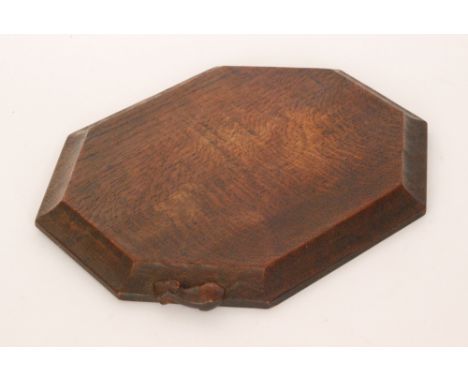 Robert 'Mouseman' Thompson - An oak breadboard of octagonal form, with adzed finish, with carved 'mouse signature', 30.5cm by