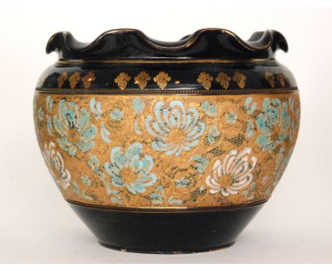 Royal Doulton - A large Chine Ware jardiniere of ovoid form with a wave rim, decorated with a central band of impressed flowe
